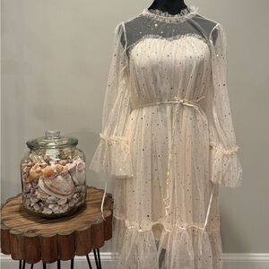 Gorgeous dress unbranded. Dress size is medium but will fit large